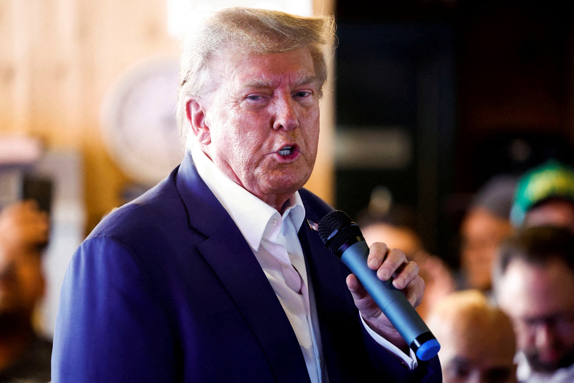 Republican presidential candidate and former U.S. President Donald Trump speaks as he campaigns at the Iowa State Fair in Des Moines, Iowa, U.S. August 12, 2023. REUTERS/Evelyn Hockstein