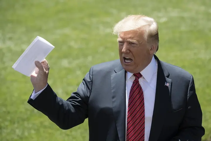Donald Trump with papers