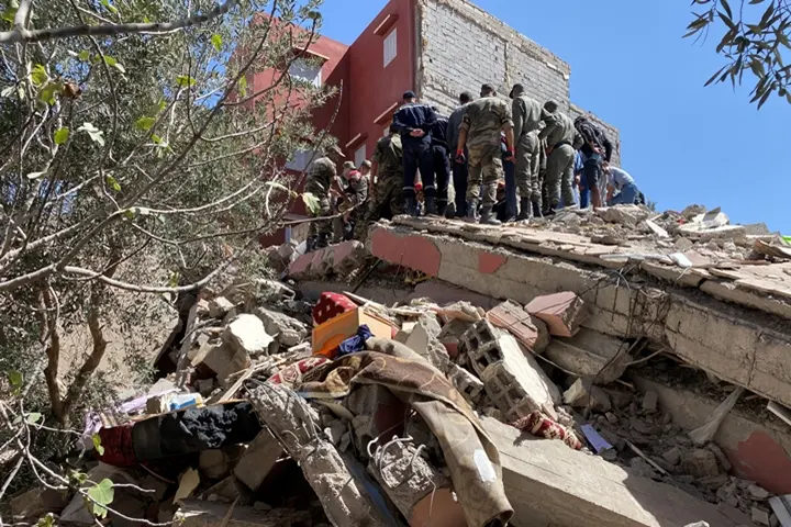 Rescuers carry a search operation following a powerful earthquake, in Amizmiz, in Morocco, September 9, 2023