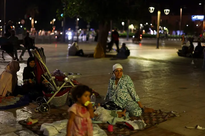 Residents rest in central Marrakesh following a powerful earthquake in Morocco, September 9, 2023. REUTERS/Hannah McKay