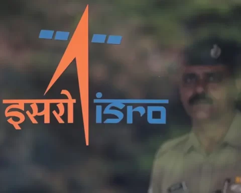 A security guard stands behind the logo of Indian Space Research Organisation (ISRO) at its headquarters in Bengaluru, India, June 12, 2019. REUTERS