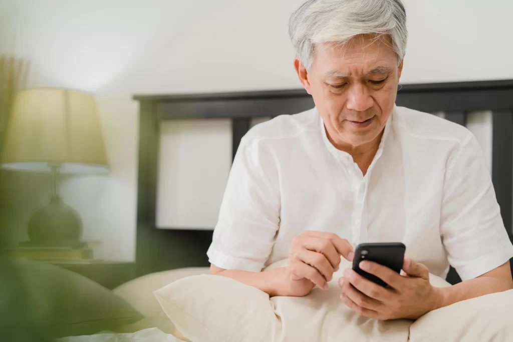 senior citizens using phone