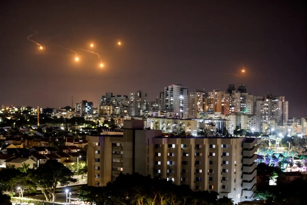 Flares illuminate the sky over northern Gaza - Israel’s security forces face questions after Hamas attack lays bare intelligence gaps