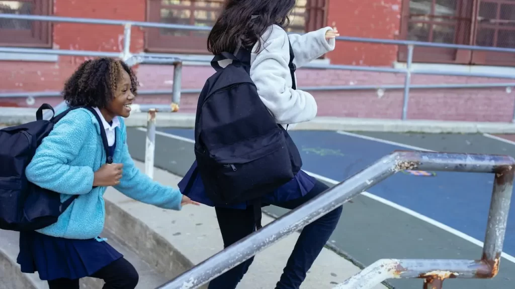 Students should carry backpacks on bold shoulders