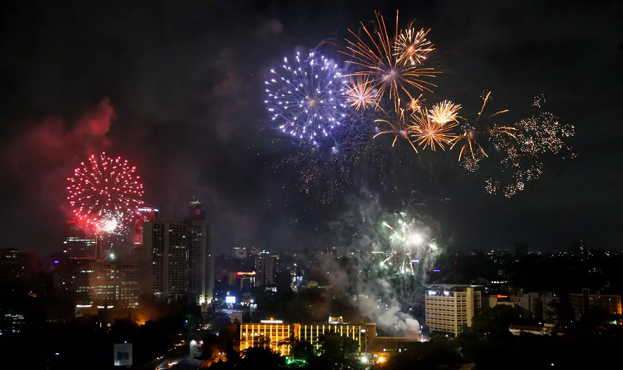 World 2024 with New Year's fireworks, reflection and a royal