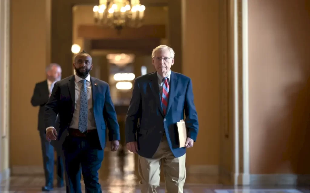 Senate Minority Leader Mitch McConnell, R-Ky., walks to the chamber
