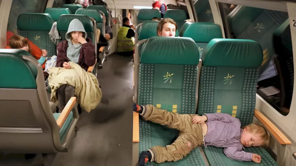 Ukrainian refugees arrive by train in Warsaw in early March 2022. Pawel Supernak/PAP/EPA