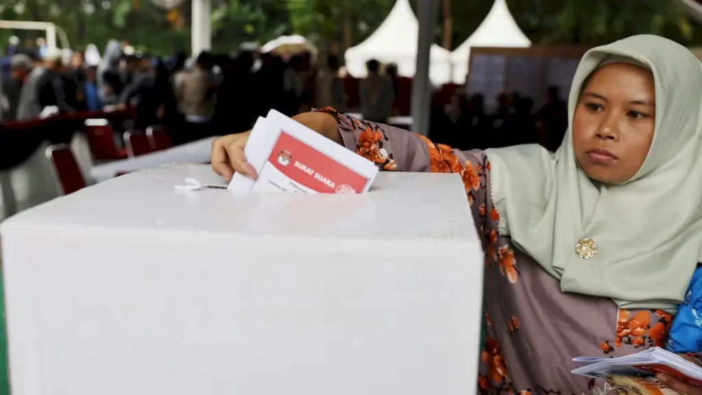 Voter casts her ballot at a polling station in Bogor West Java