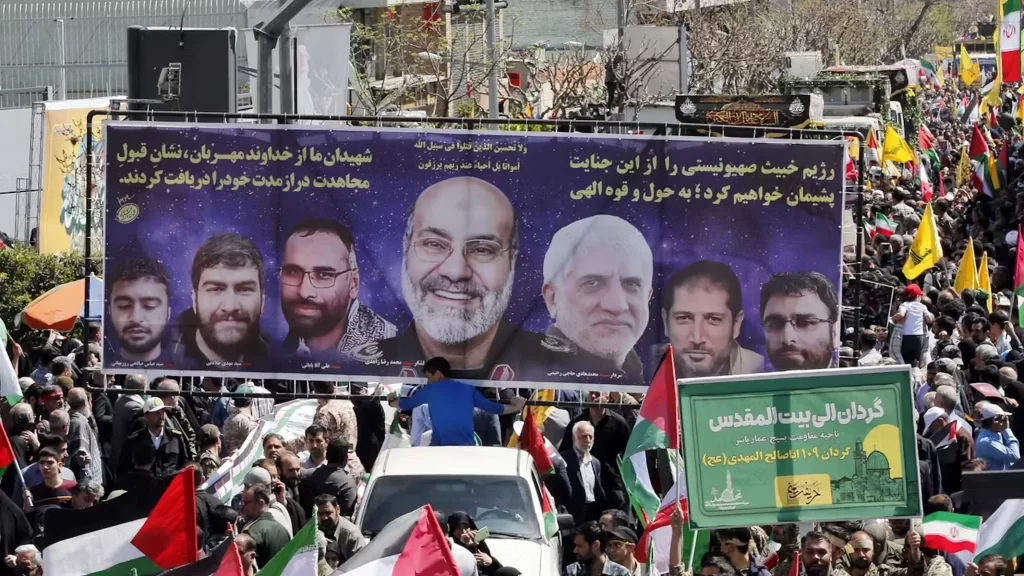 A large banner showing seven members of the Islamic Revolutionary Guard Corps who were killed in an airstrike in Syria during their funeral ceremony in Tehran Iran