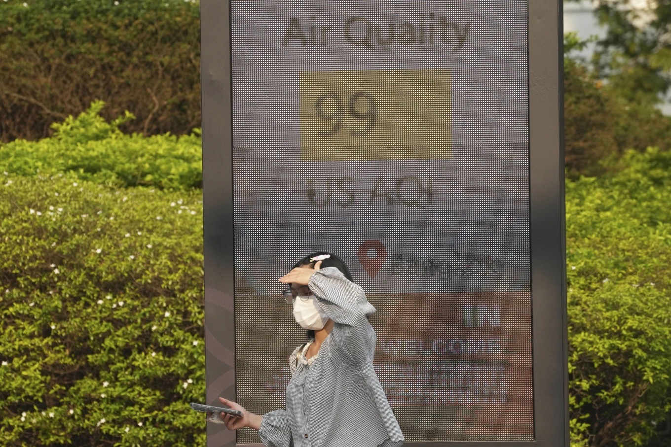 pedestrian wears a face mask Bangkok