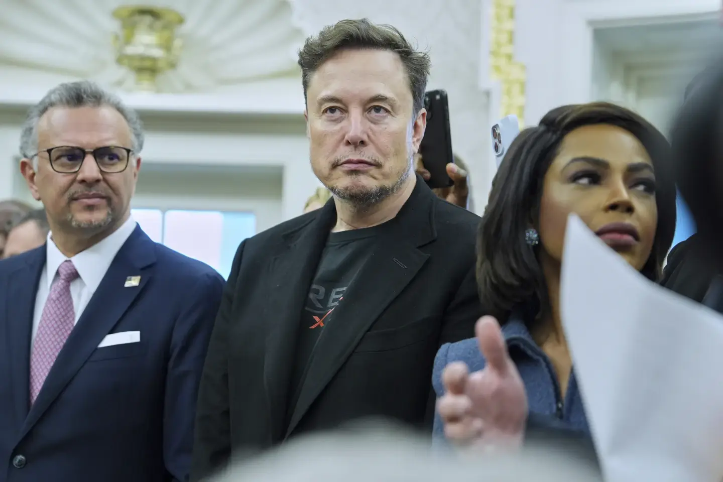 Elon Musk looks on as President Donald Trump meets South African President Cyril Ramaphosa in the Oval Office of the White House, Wednesday, May 21, 2025, in Washington