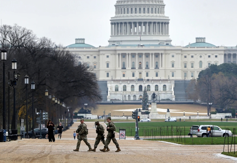 Trump criticizes the program that brought Afghan refugees to the US who fought the Taliban 2 National Guard patrol on National Mall