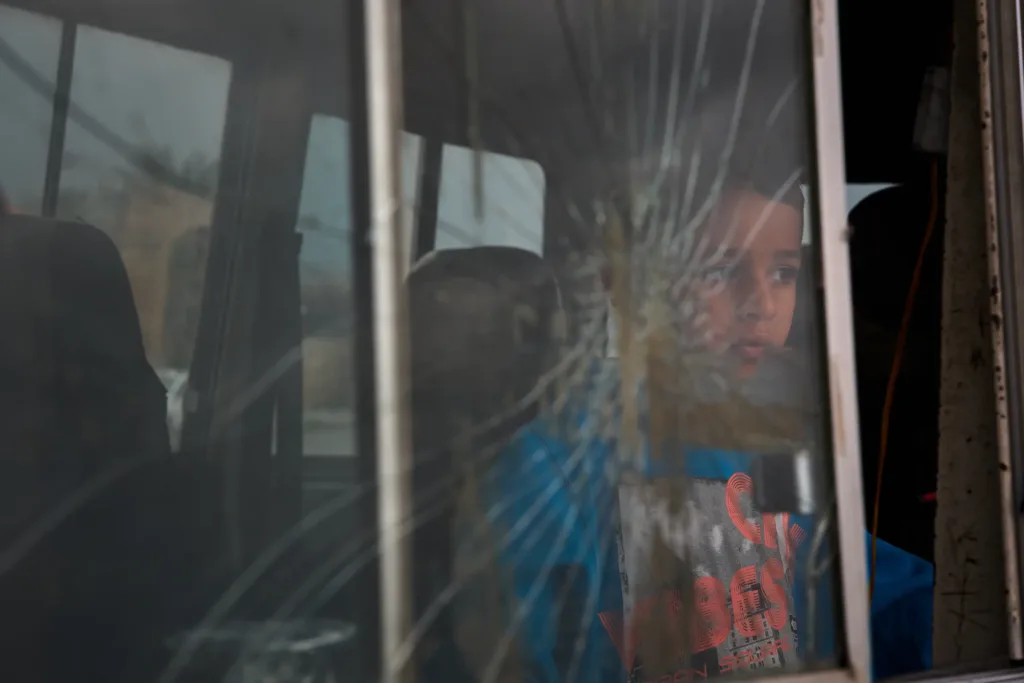Iran fires on targets across Mideast while Israel and US hit Tehran as war shows no signs of slowing 3 A boy who fled with his family following Israeli strikes in southern Lebanon sits inside the van they are using as shelter in Sidon Lebanon Thursday April 2 2026