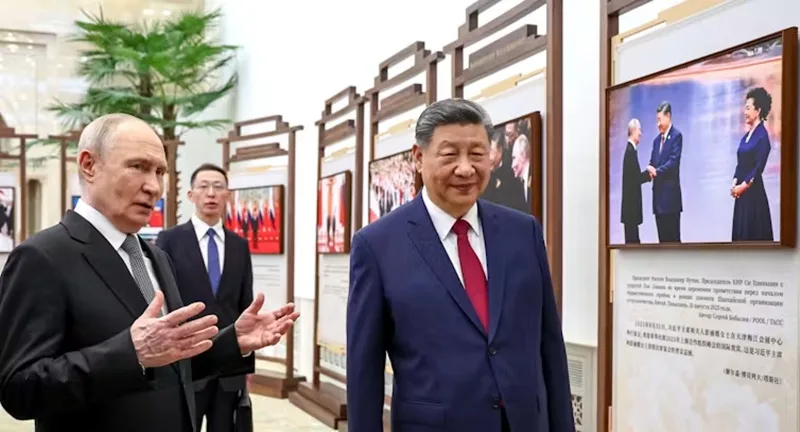 Is Beijing the world’s ‘living room’? China is enjoying the global stage, but there are limits to its influence 1 Vladimir Putin and Chinese President Xi