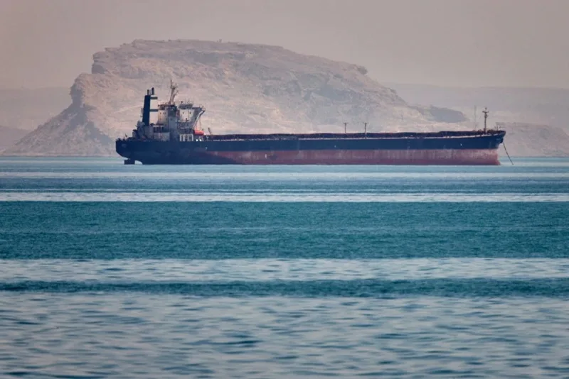 China’s top envoy meets with Iran’s in Beijing as Trump pauses US effort in the Strait 3 bulk cargo ship sits