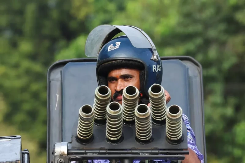 <center><i>A security personnel positions himself on a riot control vehicle, on the day of a protest by the Cockroach Janta Party (CJP) seeking the resignation of India's Chief Election Commissioner, Gyanesh Kumar, in New Delhi, India, October 11, 2026. (Photo: Reuters) </center></i> 721324786