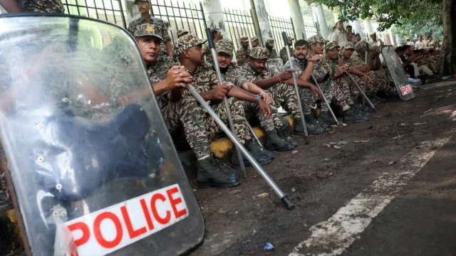 <center><i>Security personnel gather as opposition parties plan a march to the Supreme Court in protest against a controversial revision of voter lists that has sparked days of unrest, in New Delhi, India, October 12, 2026. (Photo: Reuters) </i></center> 1764472342