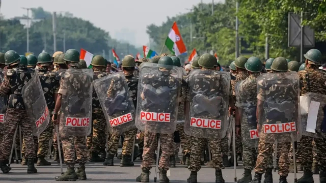 <center><i>Security personnel in riot gear arrive to escort workers of India’s opposition Congress party as they gather for a march toward the Supreme Court demanding the resignation of Chief Election Commissioner Gyanesh Kumar in New Delhi, India, Monday, Oct. 12, 2026. (Photo: AP)</i></center> 3191450864