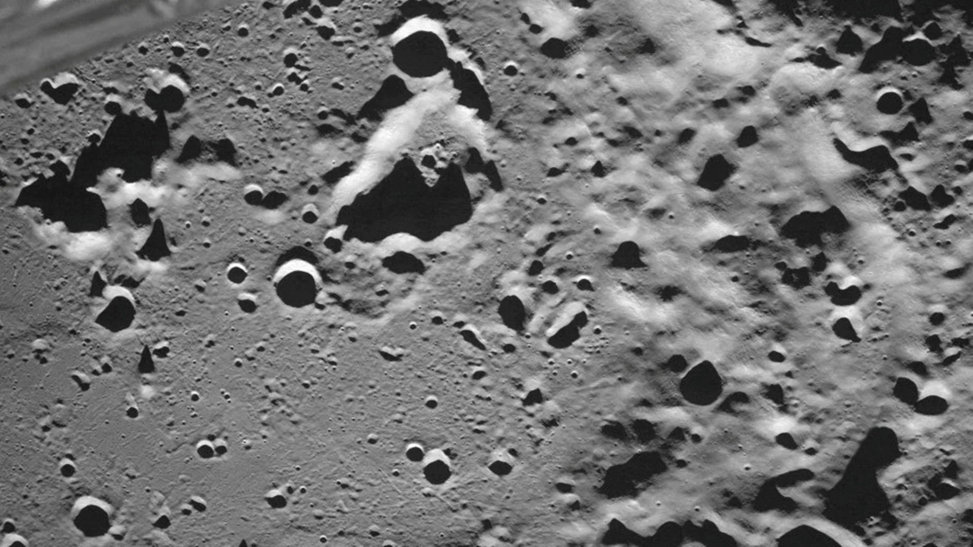 FILE PHOTO: A picture taken from the camera of the lunar landing spacecraft Luna-25 shows the Zeeman crater located on the far side of the moon, August 17, 2023. Roscosmos/Handout via REUTERS ATTENTION EDITORS - THIS IMAGE HAS BEEN SUPPLIED BY A THIRD PARTY. MANDATORY CREDIT./File Photo Acquire Licensing Rights