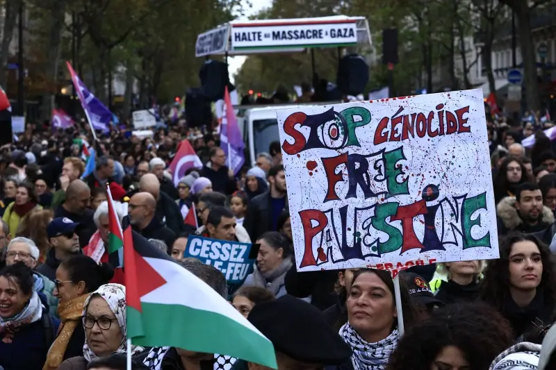 Protest marches from US to Berlin call for immediate halt to Israeli bombing of Gaza 2 Protesters march during a demonstration to support the Palestinian people in Gaza, Saturday, Nov. 4, 2023 in Paris. (AP Photo/Aurelien Morissard)