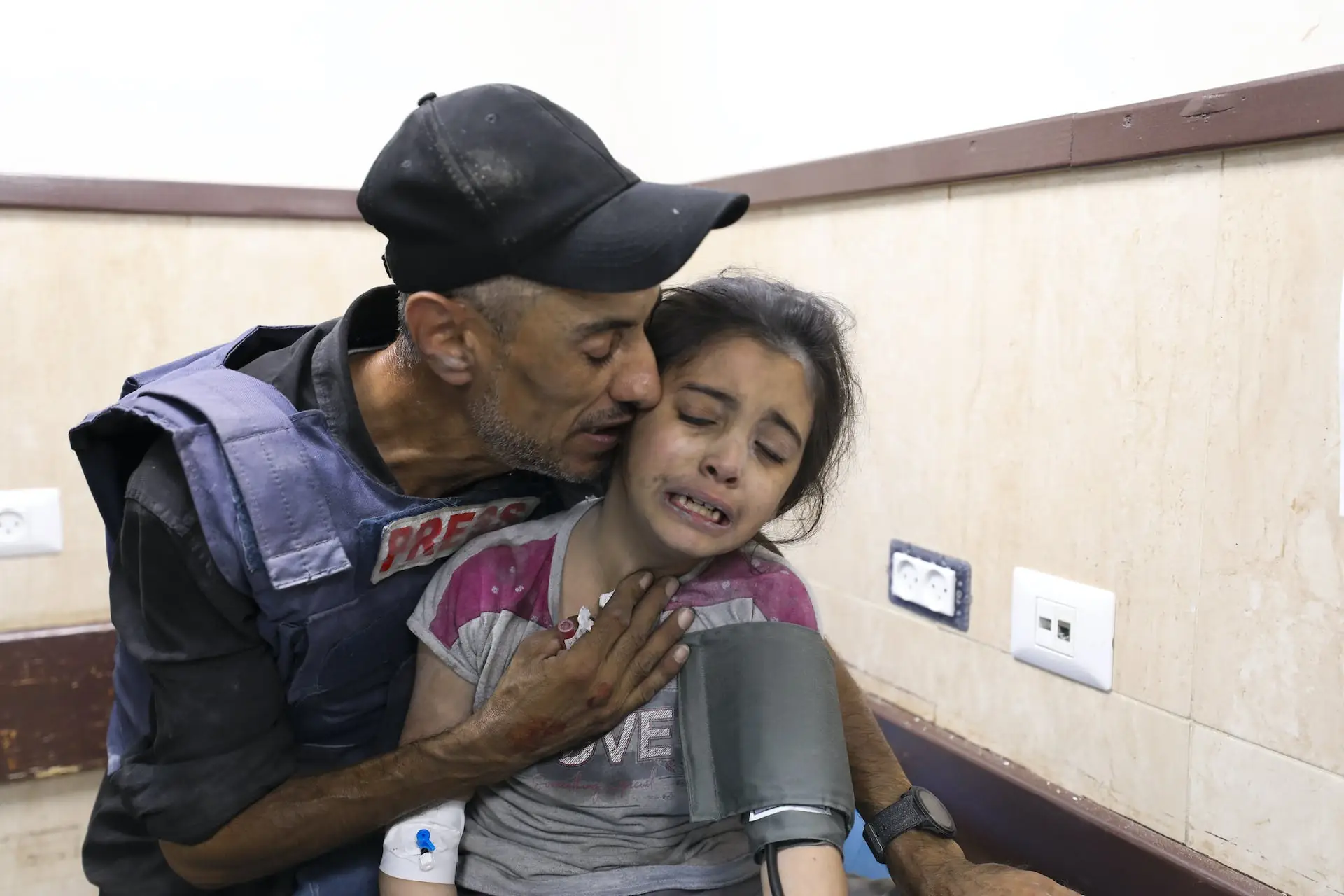 More than one journalist per day is dying in the Israel-Gaza conflict. This has to stop 1 A Palestinian journalist comforts his niece, wounded in an Israeli strike on her family home in a hospital in Deir el-Balah, Gaza Strip, October 22, 2023. Ali Mahmoud/AAP