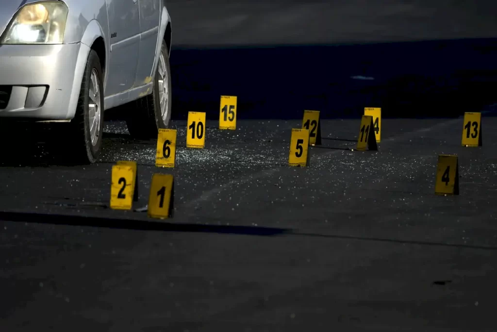 Mexico’s most dangerous city for police refuses to give up or negotiate with cartels 3 Evidence markers indicate the location of bullet casings at a crime scene