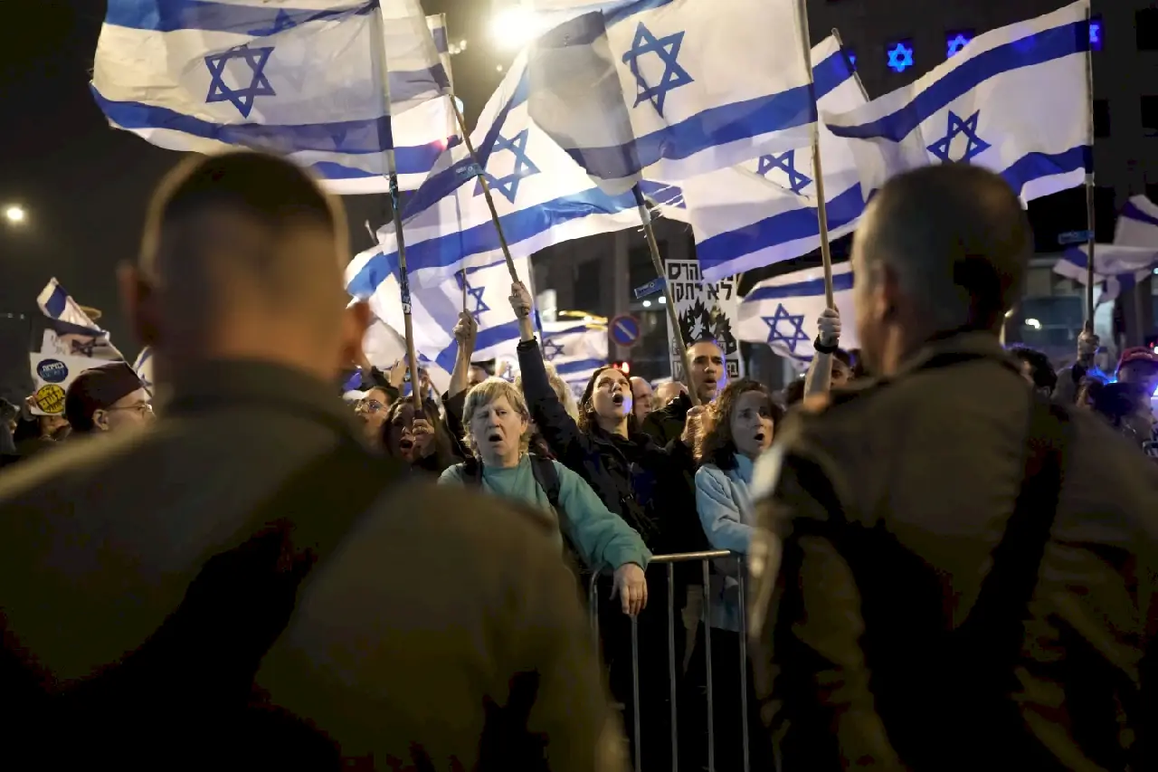 People protest against Israeli Prime Minister Benjamin Netanyahu's government in Tel Aviv