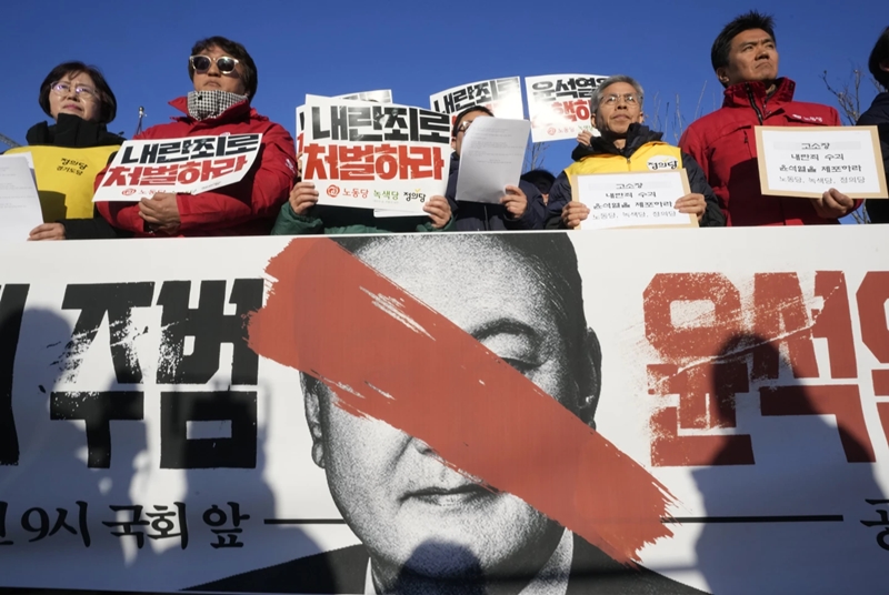 South Korean President Yoon is urged to resign or face impeachment over martial law 1 Protesters stage a rally to demand South Korean President Yoon Suk Yeol to step down