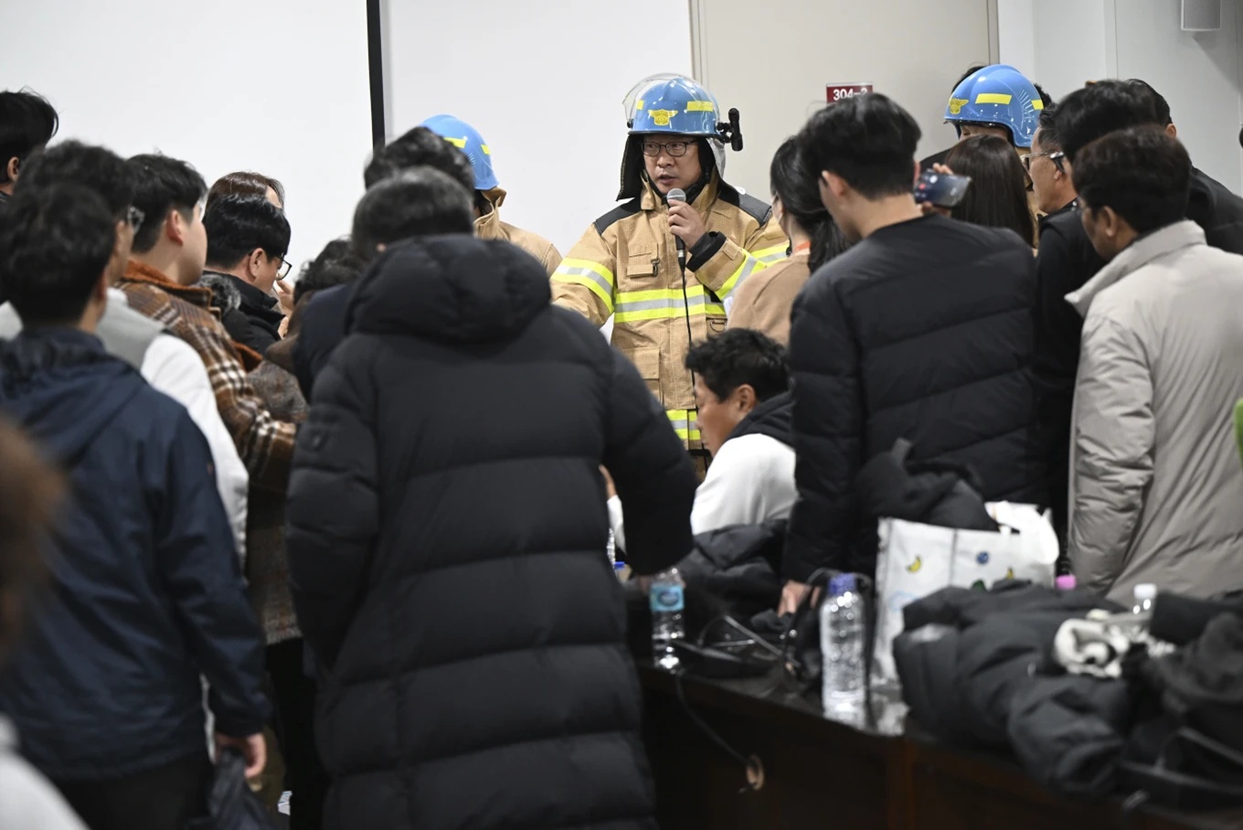 A plane is engulfed in flames after skidding off the runway in South Korea, killing at least 177 1 official from fire station