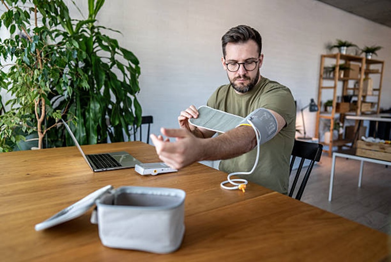 Your heart may be older than you think — and the number could predict disease risk 2 man checking blood pressure