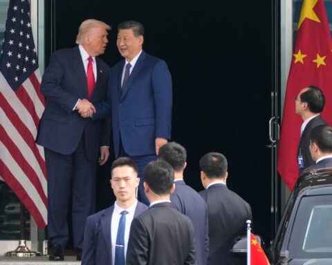 President Donald Trump left, and Chinese President Xi Jinping, shake hands before their U.S.-China summit talk at Gimhae International Airport in Busan, South Korea, Thursday, Oct. 30, 2025. (Photo: AP)
