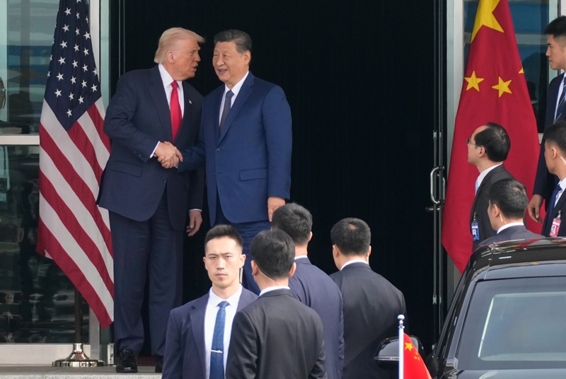 President Donald Trump left, and Chinese President Xi Jinping, shake hands before their U.S.-China summit talk at Gimhae International Airport in Busan, South Korea, Thursday, Oct. 30, 2025. (Photo: AP)