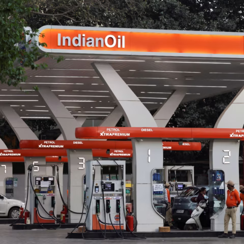 A worker stands next to a machine at an Indian Oil fuel station in New Delhi, India, March 6, 2026. REUTERS/Bhawika Chhabra