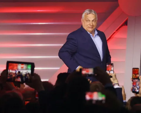 Hungarian Prime Minister Viktor Orban arrives to address supporters after the announcement of the partial results of parliamentary election in Budapest, Hungary, April 12, 2026. REUTERS/Bernadett Szabo.