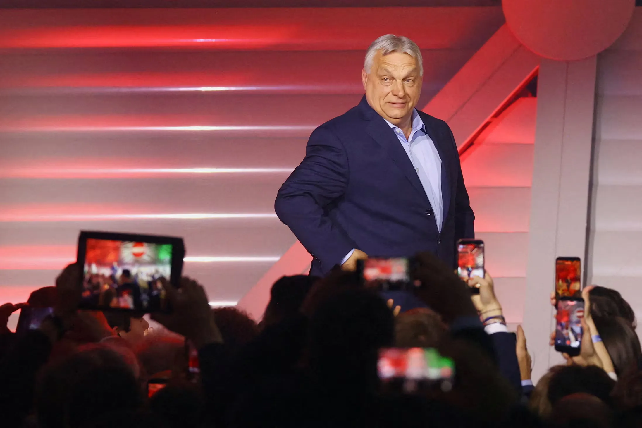 Hungarian Prime Minister Viktor Orban arrives to address supporters after the announcement of the partial results of parliamentary election in Budapest, Hungary, April 12, 2026. REUTERS/Bernadett Szabo.
