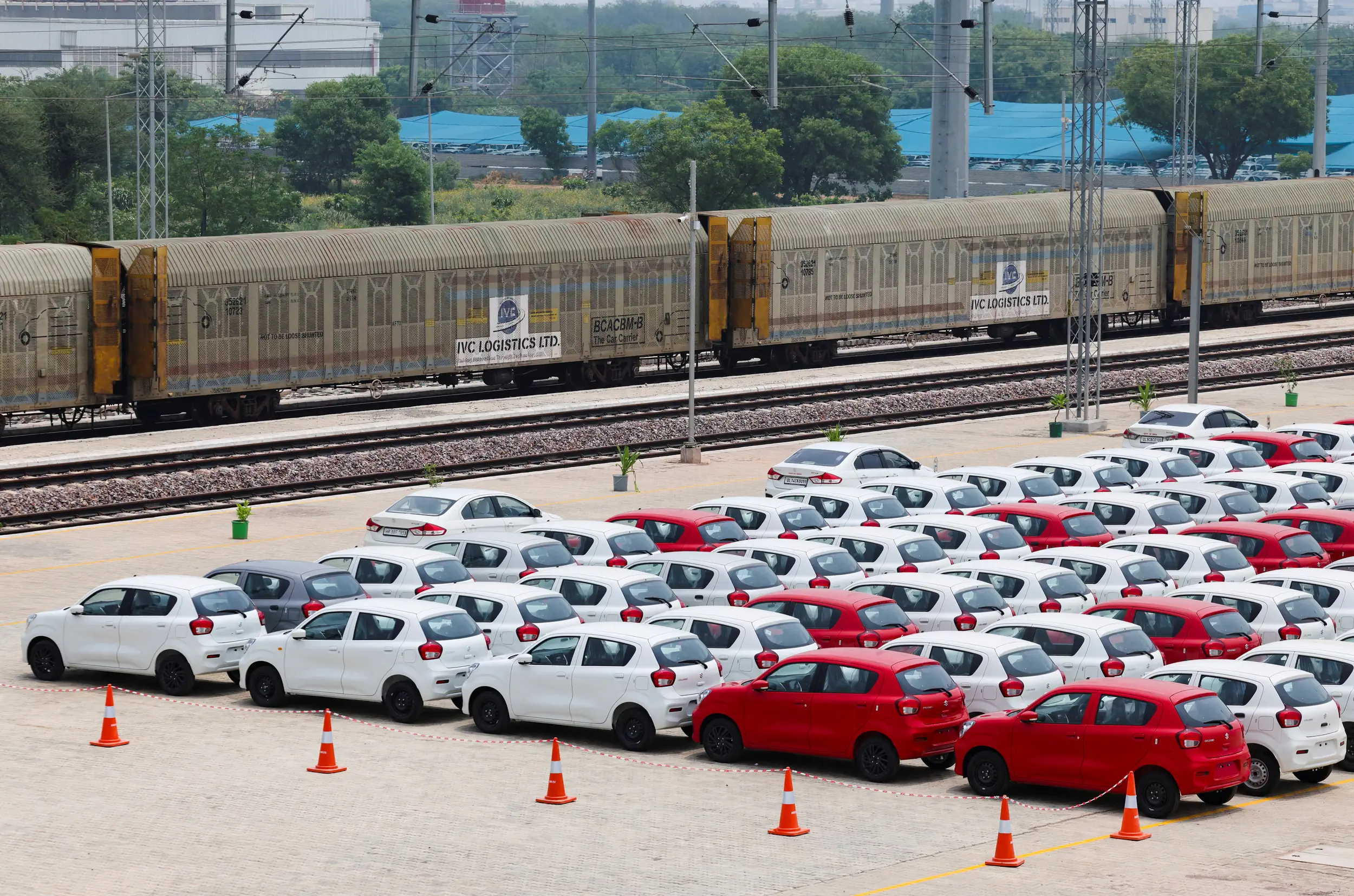 Maruti Suzuki Celerio cars are parked beside an in-plant railway siding at Maruti Suzuki's plant in Manesar, Haryana, India, June 17, 2025. REUTERS/Bhawika Chhabra/File Photo