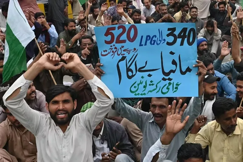 Does the Iran ceasefire mean the fuel crisis is over? Not even close 2 rickshaw drivers protesting fuel prices in Lahore Pakistan